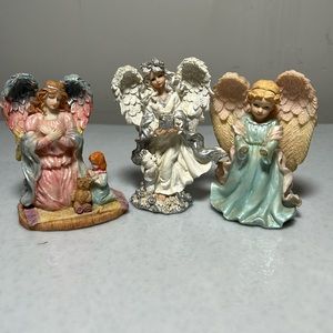 Set of Resin Angels with little Sparkle on them.